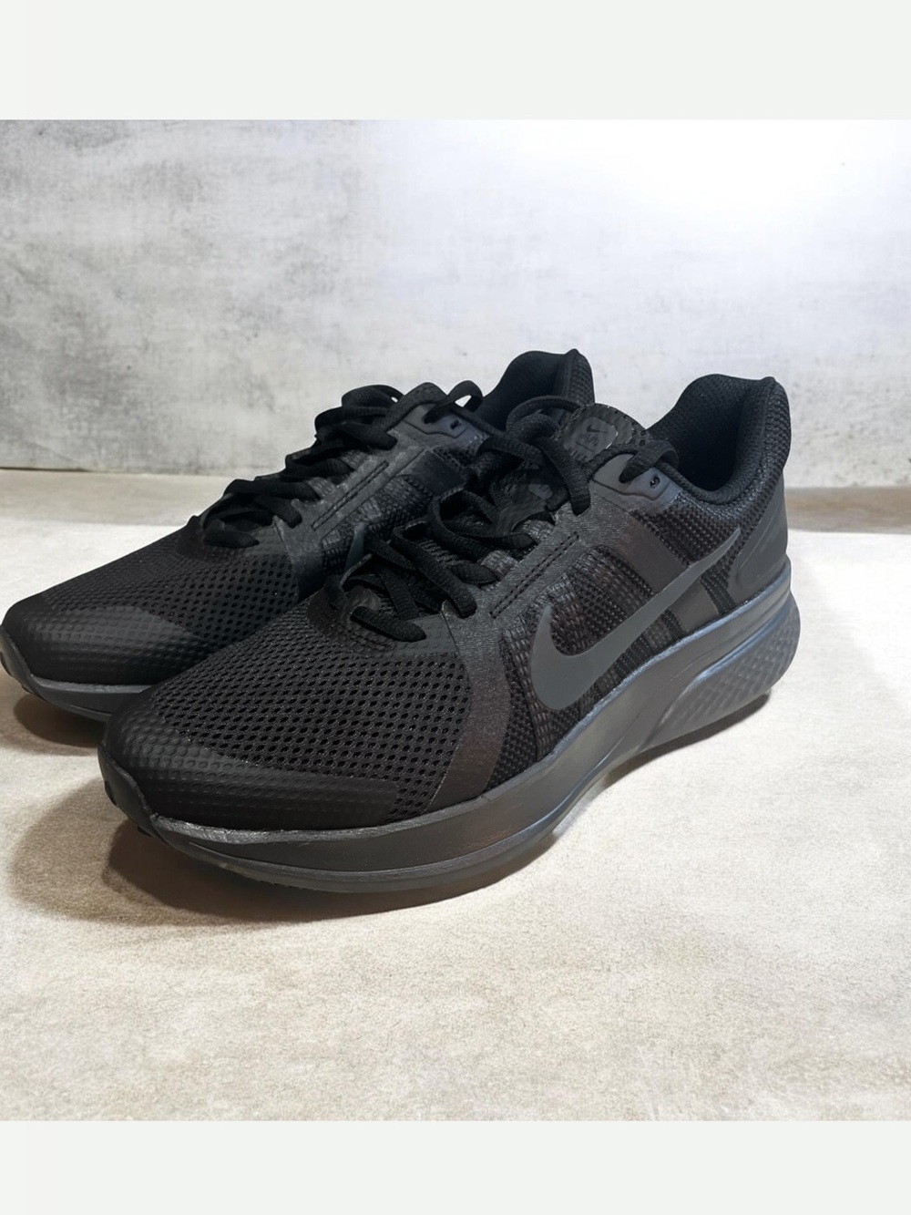 Nike Run Swift 2 Men's Running Shoes in triple black colorway. 9